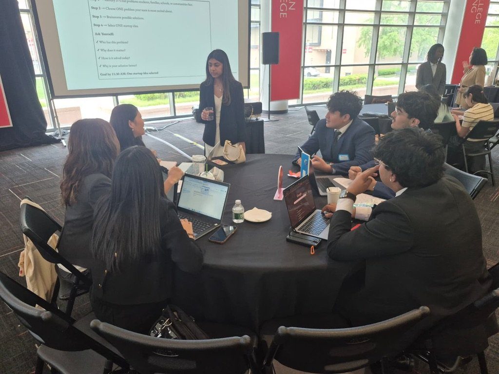 Team working around a table at Entrepreneurathon 2026