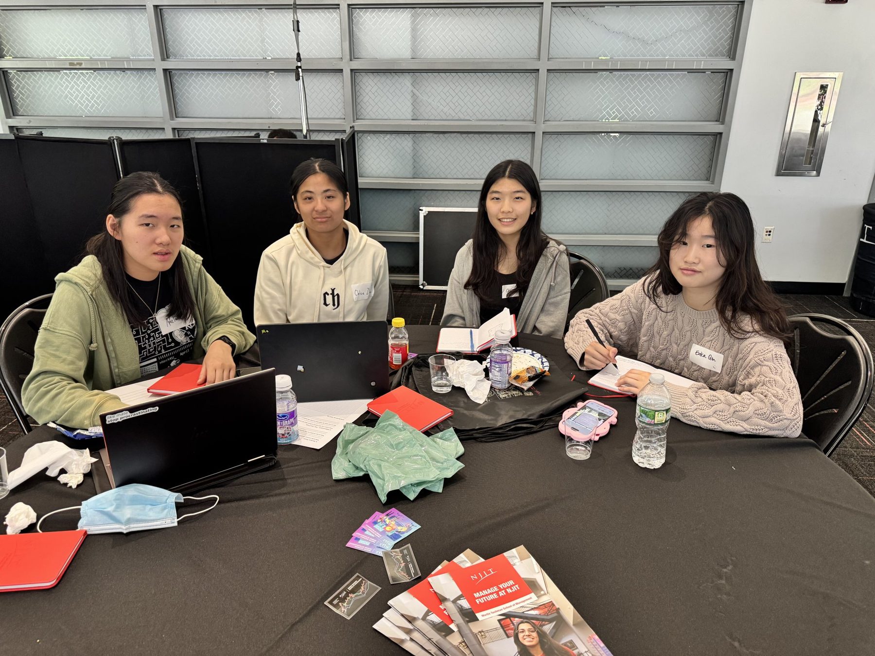 Team preparing their pitch at Entrepreneurathon 2025
