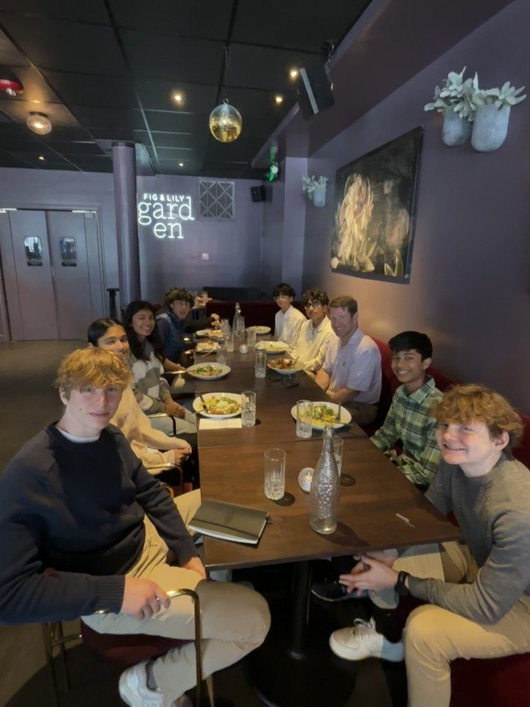 Students around the table with Eric Muller at Fig & Lily Garden, Morristown